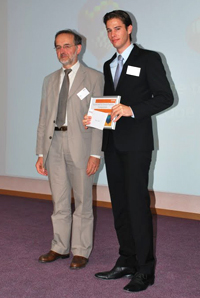 Mr. Pierre Cachet, CEO of EFQM (left) and an environmental sustainability consultant of Ricoh Europe (right)
